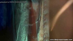 pretty brunette bolly babe undresses and dances seductively on stage with nude teasing