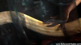 pretty brunette bolly babe undresses and dances seductively on stage with nude teasing