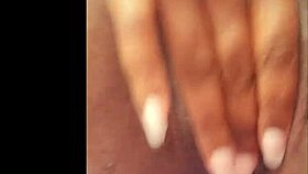 Ebony woman says, 'I'm in heat, caressing my pussy on web chat'