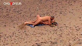 An older guy spots a hot milf flashing on the beach, then they fuck passionately as exhibitionists on the ocean shore