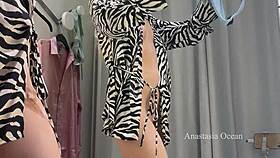 i try on different panties and lingerie in the public changing room feeling excited