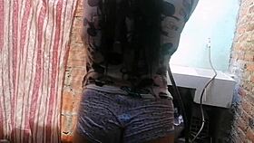 I watch the latina maid shake her big ass, her tits bouncing, making my cock so hard