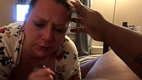 i watch my sexy pawg wife suck that big black cock and take the load on her tits.