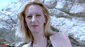 mature woman does outdoor striptease with small tits