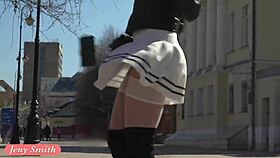 Jeny smith spins in a miniskirt on the beach, flashing her upskirt in public nudist area