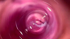 Camera dives deep into Mia's creamy tight pussy for a close view