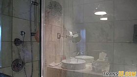 smalltitted tranny showering while filmed