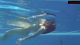 mia ferrari bathes in red lingerie underwater