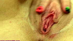 Belle spreads ass in boots with dildo!