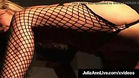 Cougar Julia Ann fiercely finger fucks her wet beaver in seductive stockings.