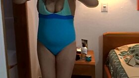 Watch this latina mom strip in her bikini on the beach