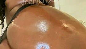 joanfantasy is all oiled up, sliding that buttplug into her tight ass