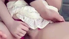 girlfriend teases on balcony and plays with pussy