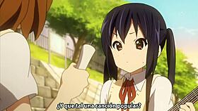 in the ninth episode of k-on season two, the girls enjoy music and anime vibes together