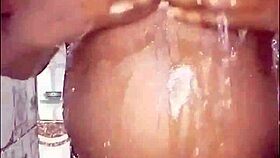 black thick ebony fucks and dances bathing in shower