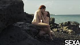 Hey, check out these two hot redheads licking and fingering each other to orgasm on the beach 😍
