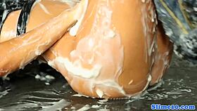 Busty babe at gloryhole for bukkake