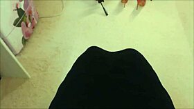 She teases with curvy legs in tan pantyhose, stroking cock in high heels. Her dirty talk drives him wild.