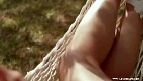 tan girlfriends kissing and using dildos outdoors