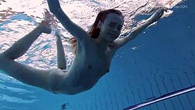 anna netrebko, tiny 18+ teen, swims underwater in public pool