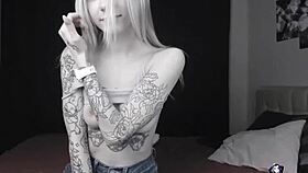 Pale slim tattoo camgirl flashes tits on cam 😏