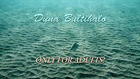 Firm big tits in red dress underwater, hinting at more with Duna Bultihalo