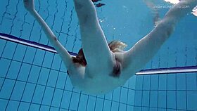 anna netrebko, tiny 18+ teen, swims underwater in public pool