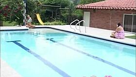 Selina 18 fingering Latina lover's pussy in steamy pool scene