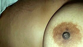 BBW squeezes her big nipples hard.