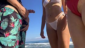 Hey, I'm jerking off at the beach watching two sexy girls in the sea who decide to help!