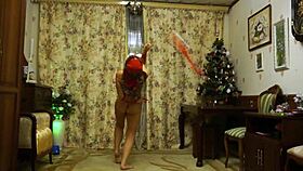 belly dancer sways in red lingerie