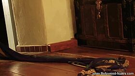 a bollywood actress UNDRESSING and DANCING in a striptease, clothes RIPPED