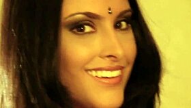 a bollywood actress UNDRESSING and DANCING in a striptease, clothes RIPPED