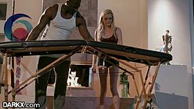 Petite teen bends over to massage massive black cock