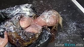 that euro slut in pantyhose and heels is getting messy at the gloryhole blowbang.