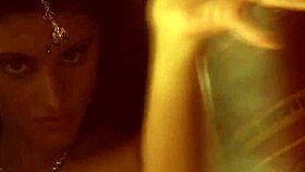 a bollywood actress UNDRESSING and DANCING in a striptease, clothes RIPPED