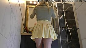 sexy blonde wife slips into new panties in the bathroom while watched