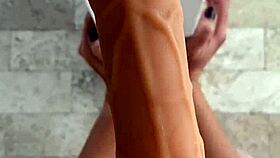 Feeling the passion as she trains her pussy with toys for fucking