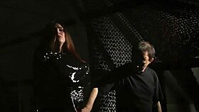 The submissive redhead slave endures bondage humiliation while sucking cock