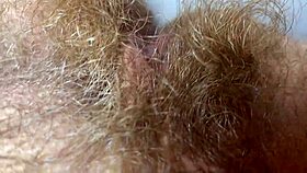 Admire this hairy pussy closeup for 10 minutes.