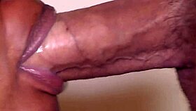 big white cock cums in ebony mouth, she swallows it