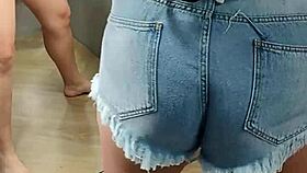 In the store's dressing room, assfucking with jewelry plugged in pussy