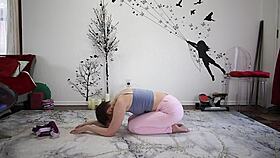 a mature brunette teaches yoga lesson 370