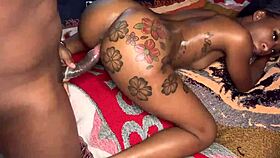 that ebony milf gives a handjob to a monster cock in the sex theater