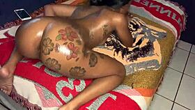 that ebony milf gives a handjob to a monster cock in the sex theater