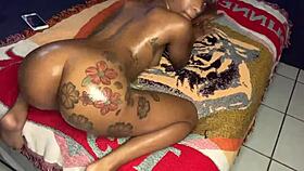 that ebony milf gives a handjob to a monster cock in the sex theater