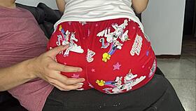 Innocent stepdaughter sits on stepfather's lap to eat while he enjoys her presence