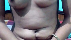 kavita feels excited removing her dress on webcam.