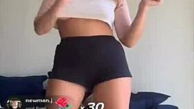 bouncing blonde titties in shorts and bra during workout