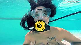 Brita piskova masturbates her tight pussy underwater in the pool